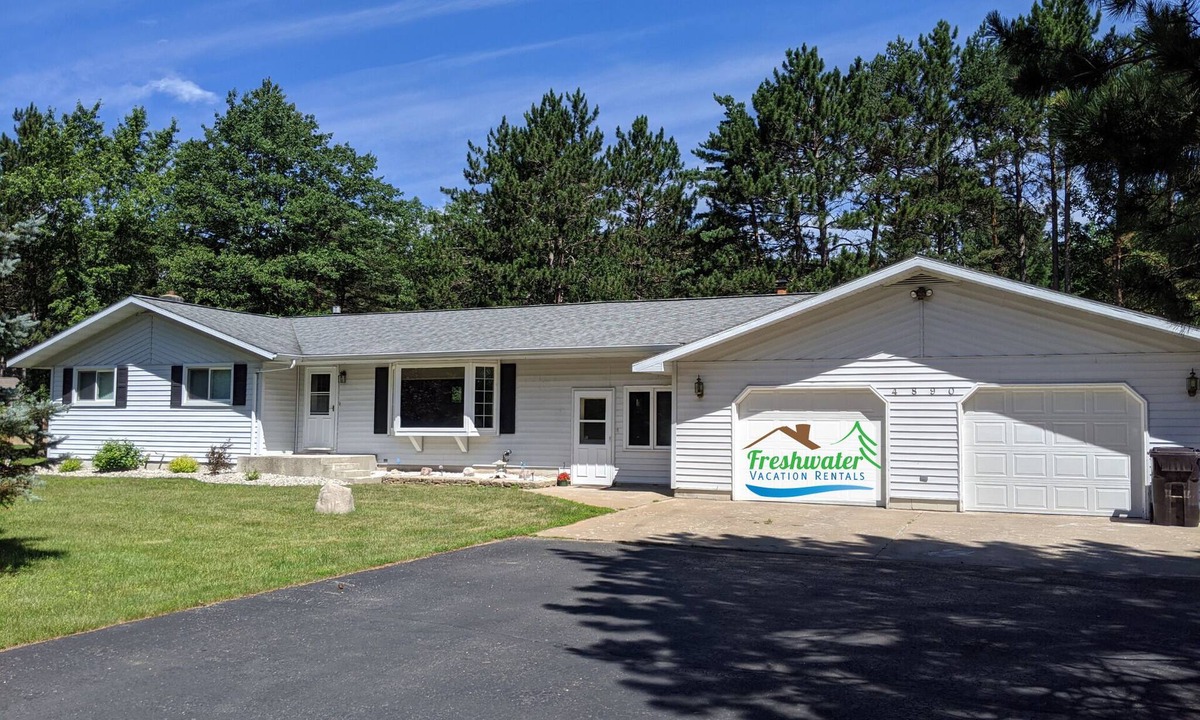 Escanaba House | Greenwood Getaway: Your Summer Escape to Lake Michigan Adventures