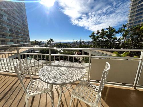 Waikiki House | Ilikai Apt 308 - Spacious Studio with Stunning Ocean & Harbor Views