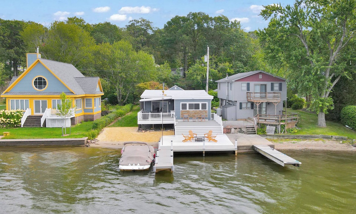 Hewitt House | Lakefront Haven Private Dock Private Beach Fire Pit Game Room