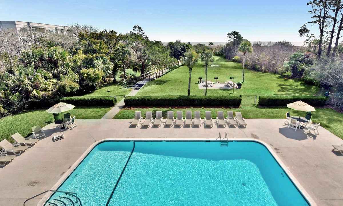 East Beach Condo | Oceanfront Condo - Private Boardwalk - Pool & Balcony