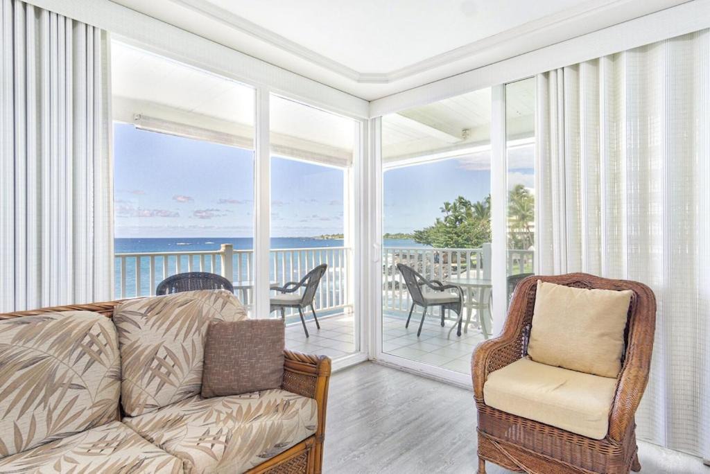 Kailua-Kona House | Oceanfront Condo Wrap-Around Lanai Almost Hanging Over The Ocean -Hale Kona Kai 313 by Casago Kona