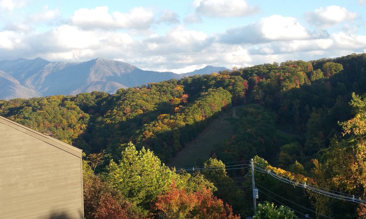 Chalet Village Condo | Relax on a cool mtn top! Amazing views, pool hot tubs suana king bed! Promos!