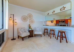 Breathtaking Ocean and Fairway Vistas From this Top-Floor Condo!