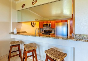 Breathtaking Ocean and Fairway Vistas From this Top-Floor Condo!