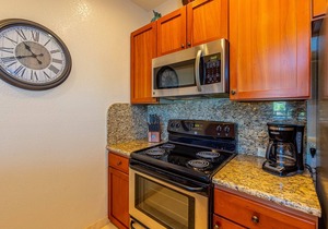 Breathtaking Ocean and Fairway Vistas From this Top-Floor Condo!