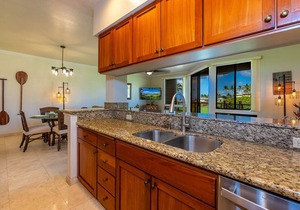 Breathtaking Ocean and Fairway Vistas From this Top-Floor Condo!