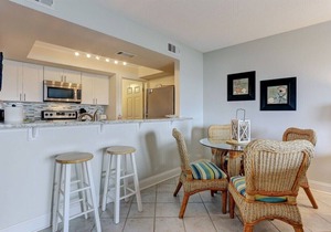 Oceanfront 2BR/2BA condo with pool, balcony, and beach access.