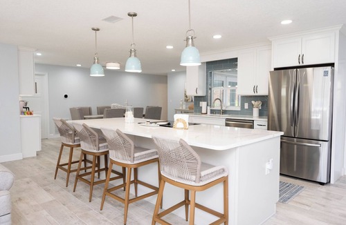 Melbourne Beach House | 4-bedroom house in Melbourne Beach w/heated pool and only steps to the beach