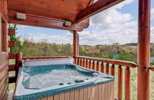 Sevierville House | A Taste Of Honey is a dog-friendly two bedroom true log cabin nestled inside the Starr Crest resort