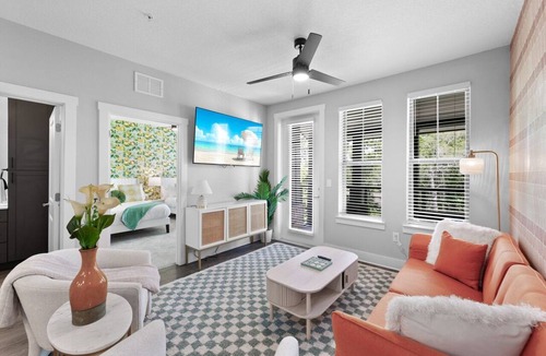 Deerwood Apartment | Beachy Bliss: Elegant 2BR/2BA with Pool & Gym