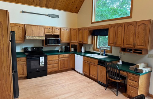 Dedham Ski Chalet | Beautiful beachfront chalet with southern exposure on Green Lake,Dedham, Maine.