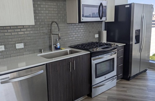 Vernon Apartment | Beautiful luxury high-rise condo with views of downtown Los Angeles in Koreatown