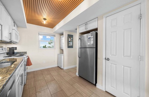South Patrick Shores Condo | Bright Cozy Condo with Pool & Stunning Ocean Views