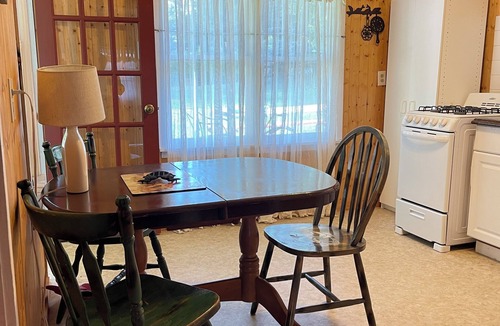 White Lake Cabin | Charming 1BR Fish Cabin with Screened Porch & Fire Pit