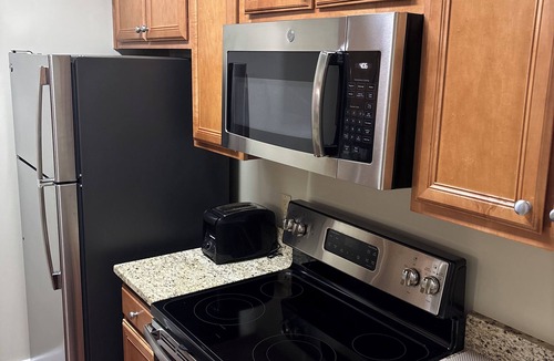Lackey Condo | Charming 2-bedroom condo in fabulous Williamsburg with AC, WiFi, fitness room
