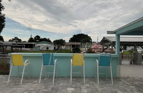 Merritt Island House | Charming 3-bedroom house with Private Boat Dock in Merritt Island, FL.