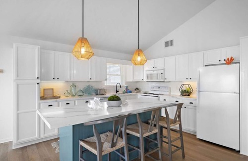 Acapulco Village House | Charming Home with Game Room, Deck & Canal Access