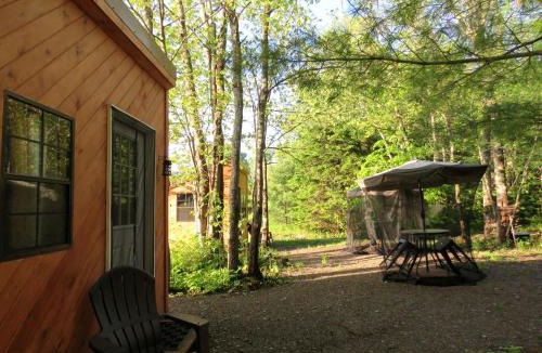 Lincoln House | Charming Off-Grid Glamping Cabins Near Lakes & Kayaking in Lincoln, Maine
