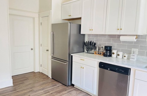 Crosstown House | Chic Crosstown Bungalow with large fenced backyard!