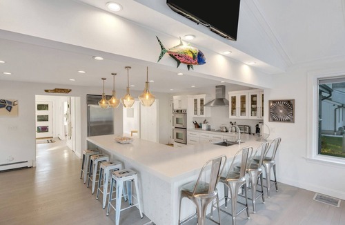 Southold House | Contemporary Bayfront Retreat with NEW Heated Saltwater Pool, Bluestone.