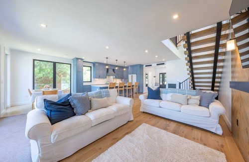 Hewitt House | Designer Lakefront | Kayaks Dock Firepit