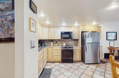 East Village at Copper Condo | Dog-friendly, ski condo with golf course views, balcony, hot tub & sauna
