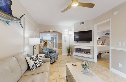 Cape Caneveral Beach Gardens Condo | Ground Floor Condo with Shared Heated Pool, High-Speed WiFi, and Central AC!