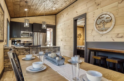 Gatlinburg - Pigeon Forge Ski Chalet | Header: Whiskey Splash | Indoor Pool · Hot Tub · 75-Ft Waterfall · Sleeps 10