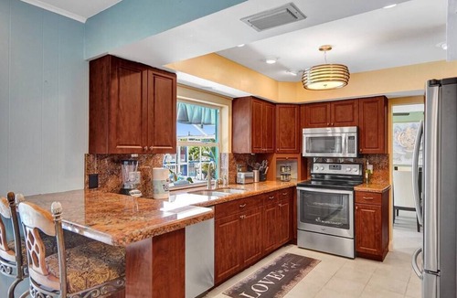 Coral Ridge Isles Villa | Heated Pool-Waterfront 4BD Villa: Deck&BBQ