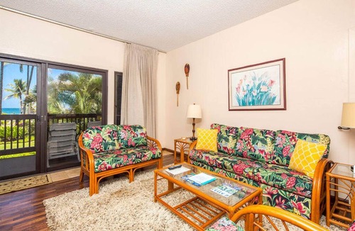 Lihue Condo | Island Touches w/Modern Kitchen, Wood Floors, Lanai, Flat Screen, WiFi–Kaha Lani 203
