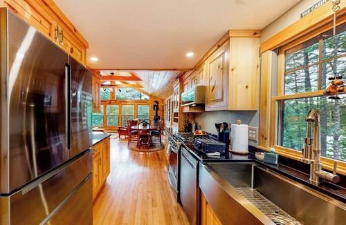 Oxford Cabin | Lakefront home with lovely lake views - one mile from the casino