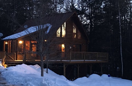 Kents Hill House | Light-Filled Log Home, 4 Wooded Acres, & Lake Access. The water is 0.4 mi away.