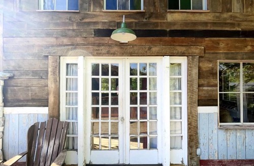 Excelsior Springs Cabin | Light-Filled Lakeside Cabin with Private 15-Acre Spring-Fed Lake Near Downtown Excelsior Springs, Missouri