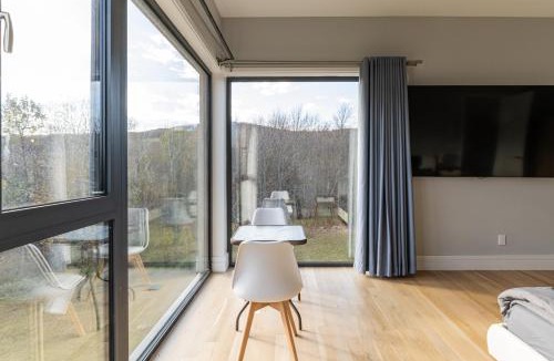 Stamford Villa | Modern Catskill House & Lake NY with hot tube on the roof