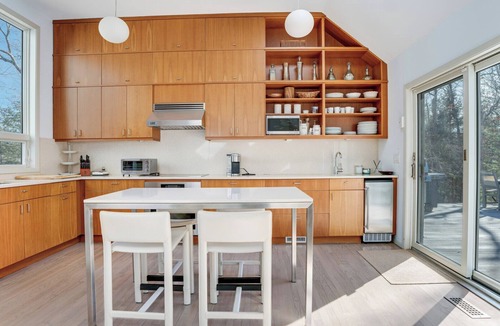 Northwest Harbor House | Modern East Hampton home with private heated pool, outdoor dining, perfect.