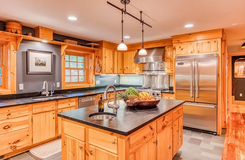 Glendale House | Modern Log Cabin with Saltwater Pool & Mountain Views By Evergreen Home