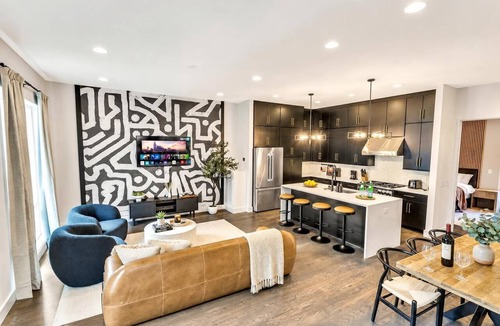 Katie Hill Neighborhood House | Nashville rooftop hot tub, game room & makeup bar house, sleeps 12