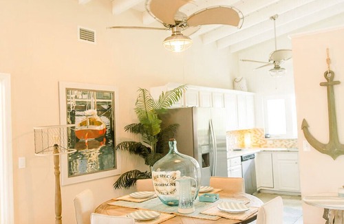 Royal Harbor Condo | New! Waterfront, 1/2 block to Naples Bay, Bike! Private Doc! Pet Friendly!
