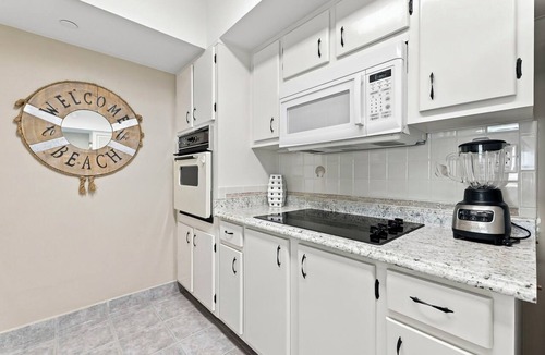 South Patrick Shores Condo | OCEAN BREEZE ESCAPE - 2nd Floor Balcony with FULL oceanfront views! 2 bdr 2 Bath