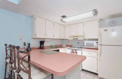 Crescent Beach Condo | OCEAN FRONT! Beautiful views Ground Floor End Unit! Private Dock & boat ramp.