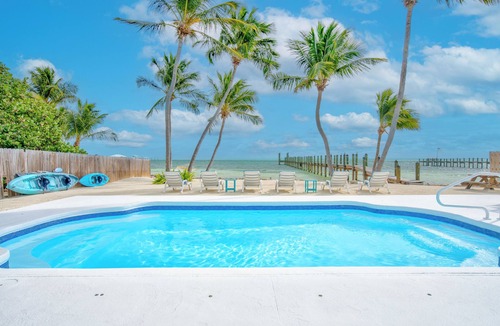 Tavernier House | Oceanfront Estate with Private 350 foot Pier, Heated Pool, Pet Friendly