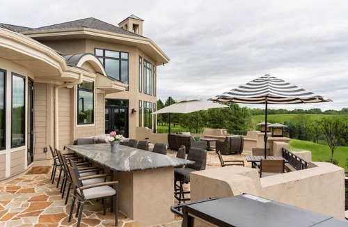 Wernersville House | Overlook Retreat Manor is a luxury private estate on 100 scenic acres for up to 24 guests. Enjoy the pool, hot tub, game room, sports court, and breathtaking sunset views. The kind of place people talk about long after they leave.