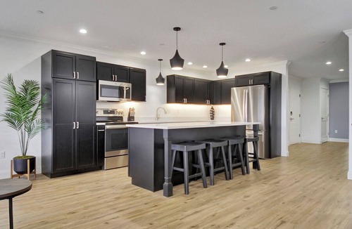 Waterville Apartment | Penthouse 1-bedroom corporate apartment in Downtown Waterville!