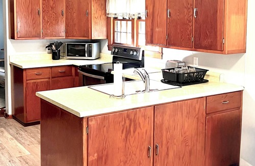 Saint Joseph House | Perfect Summer Getaway- 2 bed, large private yard, ravine lot, gameroom