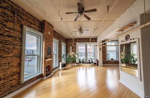Watertown Apartment | Rustic short‑term hospitality space in Downtown Watertown.