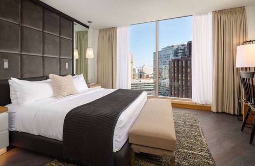 Logan Square Hotel | Skyline Pool Access with Skydeck + Fitness Room
