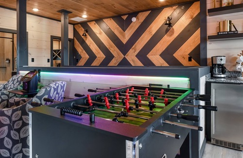 Sevierville Ski Chalet | Sleeps 22 + Indoor Pool + FREE Waterpark Access + Theater + Game Room + Hot Tub
