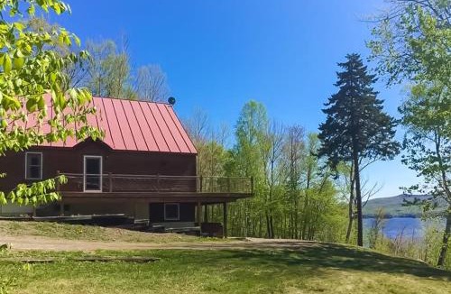 Greenville Junction House | Spectacular lakefront home with dock, firepit, & vaulted ceilings - dog-friendly