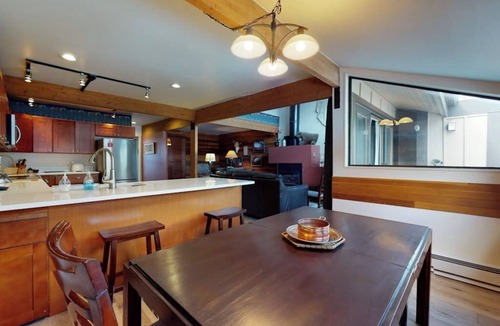 East Village at Copper House | Stylish townhouse with mountain and golf views, shared hot tub, and balconies