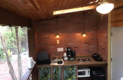 Fern Forest Cabin | tiny home 1- with kitchen equipped with essentials near at the Volcano Park!